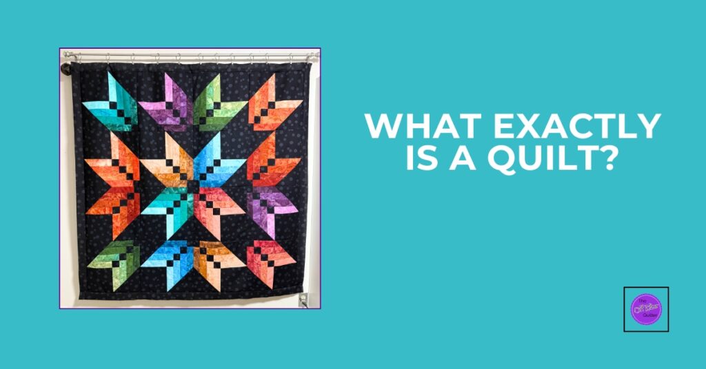 A colourful star quilt on a black background. Text reads: what exactly is a quilt?