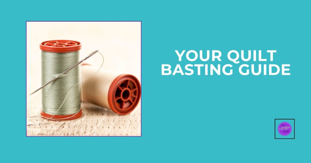 Two spools of thread with a sewing needle